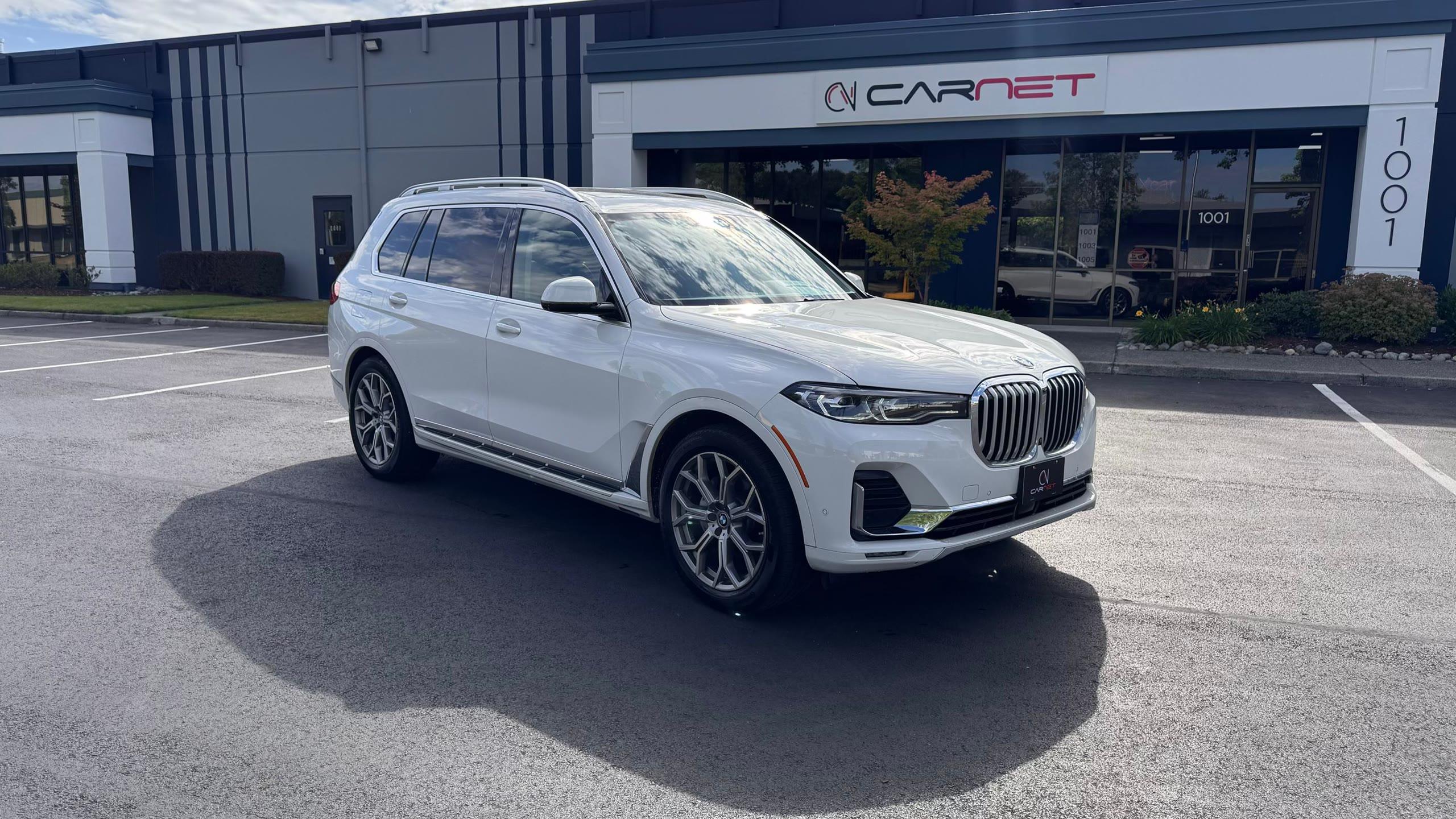 BMW X7 outside the Luxcar Rentals facility in Tukwila